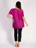 Elegant Fuschia Plissé Short Sleeve Top with Chic Hem Cut-Out Detail