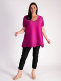 Elegant Fuschia Plissé Short Sleeve Top with Chic Hem Cut-Out Detail