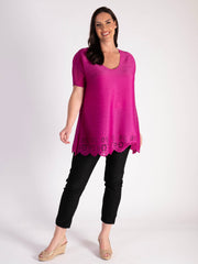 Elegant Fuschia Plissé Short Sleeve Top with Chic Hem Cut-Out Detail