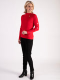 A Red Roll Neck Jumper With Button Detail