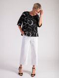 Black Circle Print Roundneck Top with Stepped Hemline