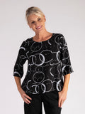 Black Circle Print Roundneck Top with Stepped Hemline