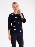 A Navy/White Diamond Pattern Jumper – Understated Elegance