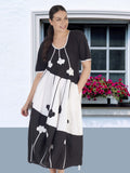 Black Dress with Flower Placement